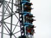 Millennium Force: close-up of people on first drop